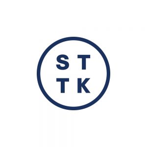 STTK:n sinivalkoinen logo, jossa ympyrän sisällä kirjaimet s t t k
